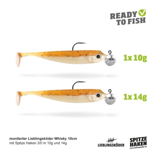 Das Actionpack Whisky 10cm enthält zwei Weichplastik-Angelköder mit Haken und silbernen Jigköpfen (10g & 14g). Beide sind mit "READY TO FISH" beschriftet, messen 10 cm und werden mit Spitze Haken geliefert.