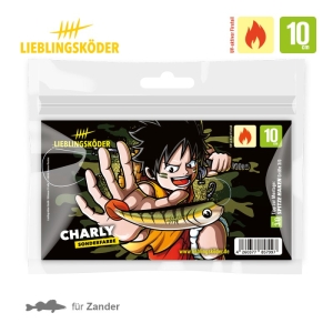 Eine Packung Charly 10cm Lieblingsköder mit einer Figur im Anime-Stil, die einen Köder hält. Auf der Verpackung steht "Sonderfarbe" und die Eignung für Zanderfische.