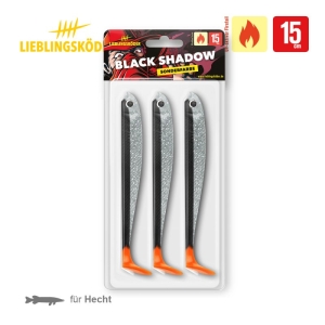 Eine Packung mit drei Black Shadow 15cm-Angelködern für Hechte, jeweils mit orangefarbenen Schwänzen, schlichtem Schwarz und Silber und mit dem "Lieblingsköder"-Logo sowie einem Feuersymbol, um diese Sonderedition hervorzuheben.