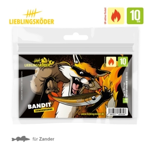 Die 10-cm-Verpackung des Bandit zeigt einen Cartoon-Fuchs, der auf einen fischförmigen Köder beißt. Das Design ist hauptsächlich schwarz-weiß mit gelben und orangefarbenen Akzenten. Der Köder ist 10 cm lang und wird für das Zanderangeln empfohlen.