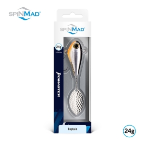 Ein verpackter Jigmaster Captain 24g Angelköder in Silber mit einem orangefarbenen Akzent an der Öse wird in einer meist weiß-blauen Schachtel mit dem SpinMad-Logo an der Spitze geliefert.