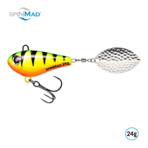 Ein farbenfroher Jigmaster Firetiger 24g Angelköder mit gelben und grünen Streifen, rotem Auge, silbernem strukturiertem Spinnerblatt und dreifachem Haken.
