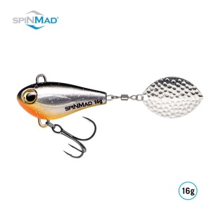 Der Jigmaster Captain 16g ist ein Metallköder mit schwarzem, silbernem und orangefarbenem Farbverlauf, einem strukturierten, silbernen Spinnerblatt am hinteren Ende und einem einzelnen Drillingshaken - ideal für Angler, die Spitzenleistung suchen.