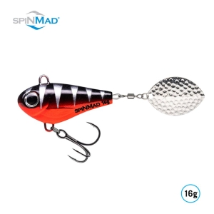 Der Jigmaster Black Perch 16g Angelköder besticht durch sein rot-schwarzes Design mit einem silbernen Spinnerblatt und einem Drillingshaken. Oben links ist das SPINMAD-Logo zu sehen und unten rechts steht "16g" - ideal für Black Barsch-Angler.